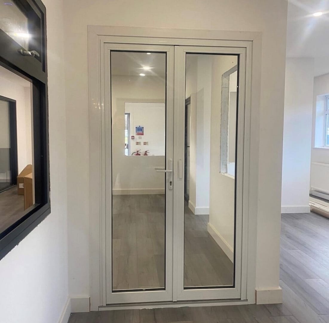 white aluminium French doors in showroom