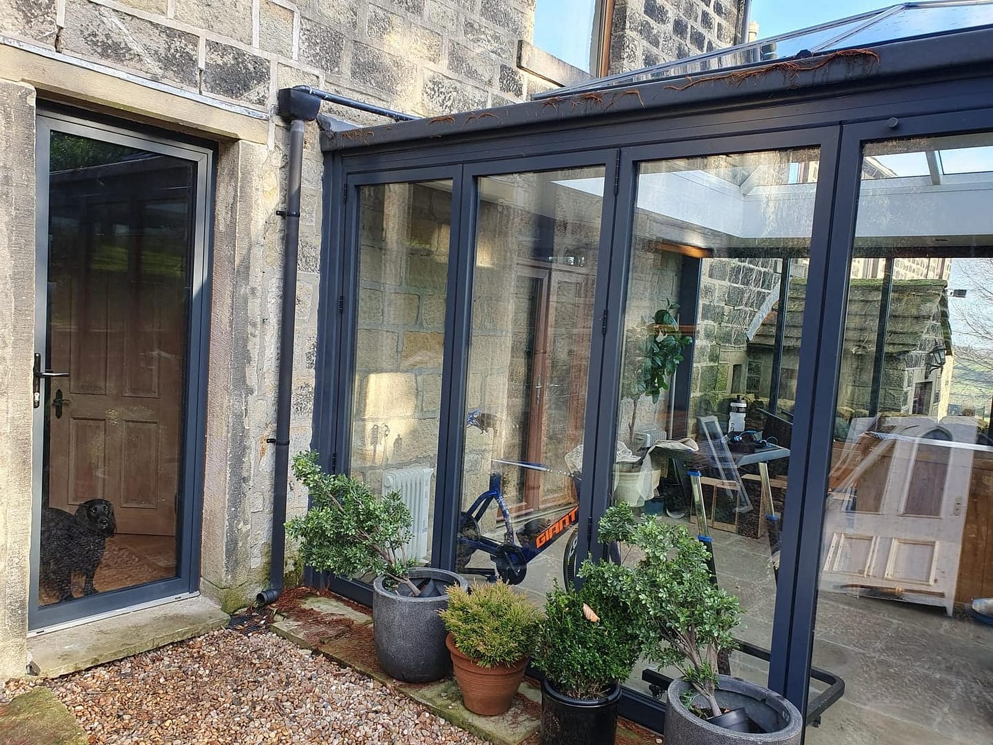 cottage style home with aluminium glazed door