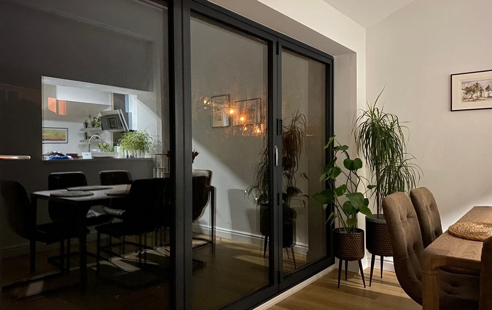 anthracite aluminium bifold door in modern dining area