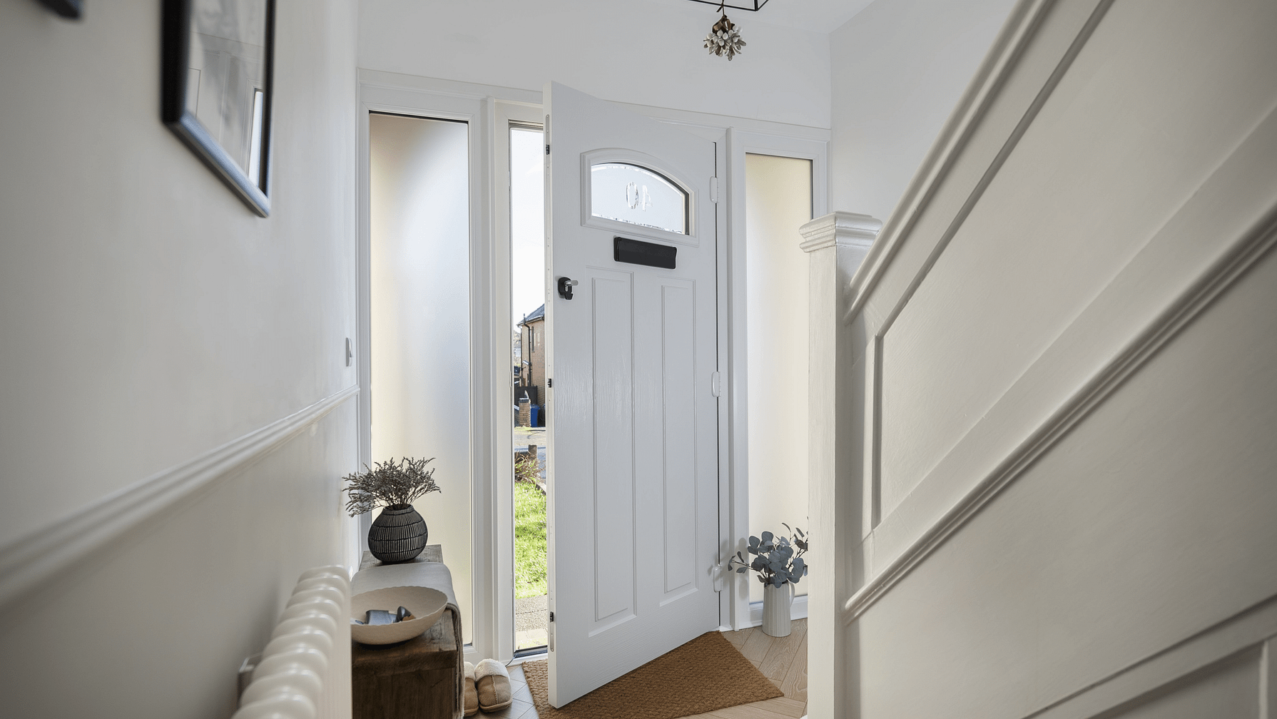 composite front door in white with matching side panels