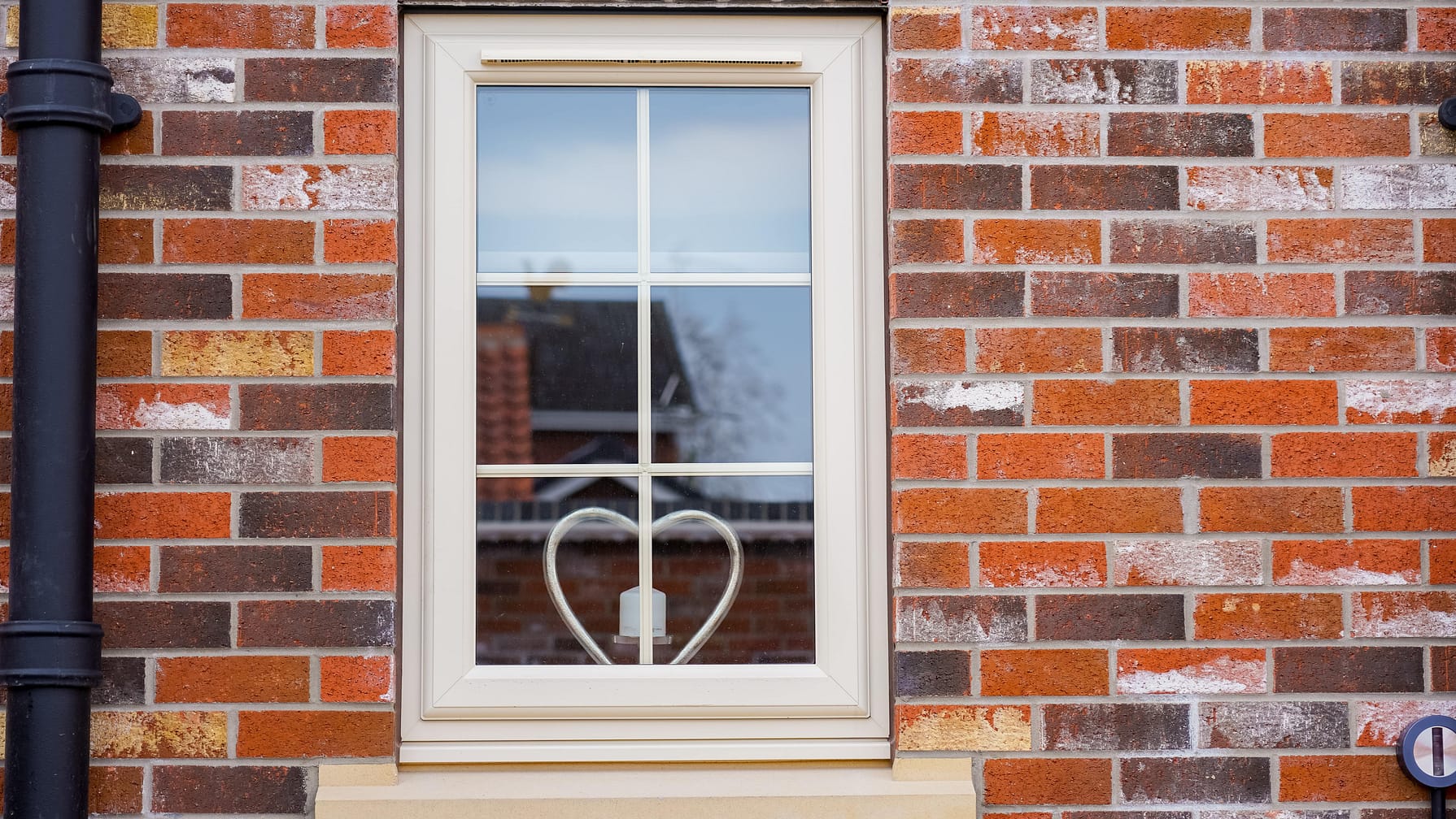 upvc single window with georgian bars in cream