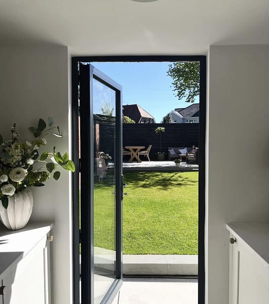 sunny garden views from aluminium glass door