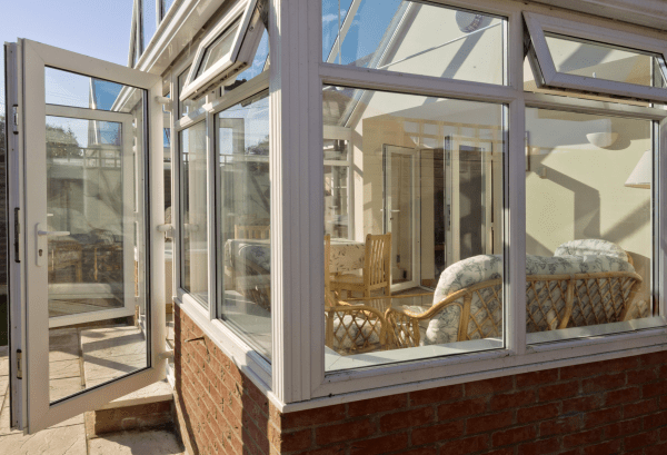 conservatory with upvc windows and french doors