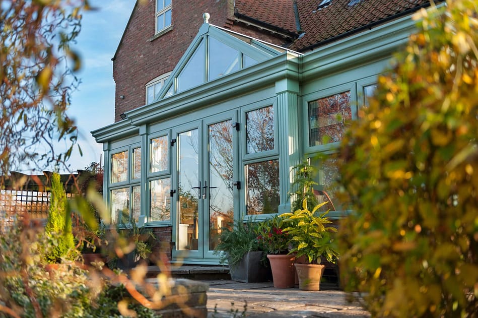 chartwell green upvc french doors on conservatory front